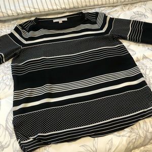 Versatile blouse with modern design!